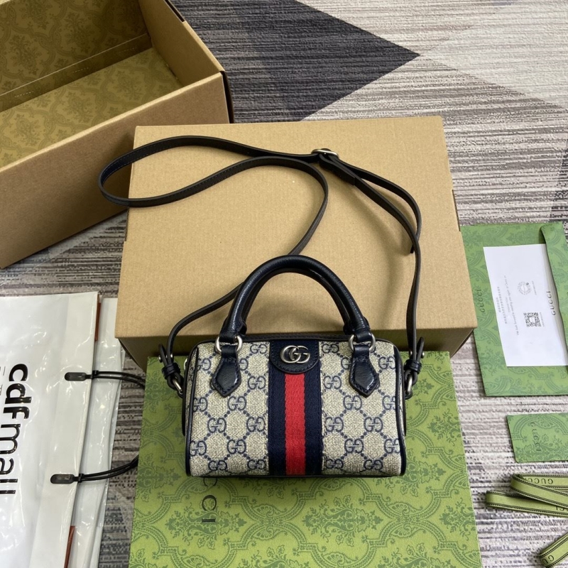 G*u*i top handle bags